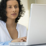 Woman Using Laptop